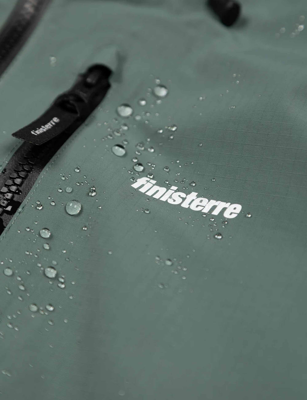 Finisterre Stormbird Waterproof Jacket in Deep Sea, styled view